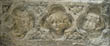Panel 19:00 - Three heads (badly eroded)